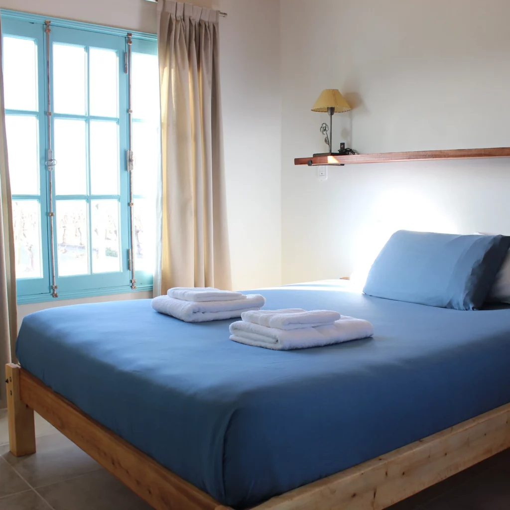 Dormitorio de casa Cielo con cama doble